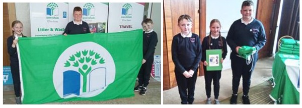 Children collecting the green schools flag